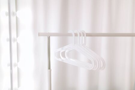 Stylish white hangersの写真素材