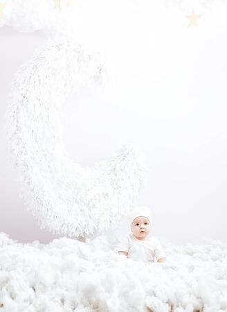 little very beautiful baby girl, looking at cameraの写真素材