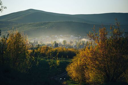 Beautiful landscape of a village under the mountain, environmental pollution
