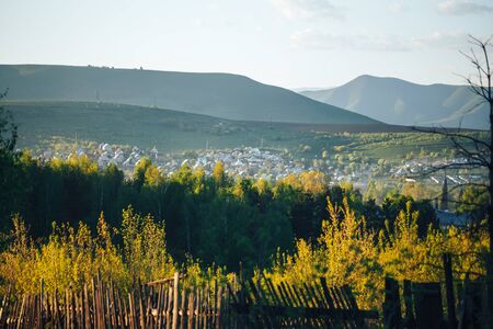 Beautiful landscape of a village under the mountain, environmental pollution