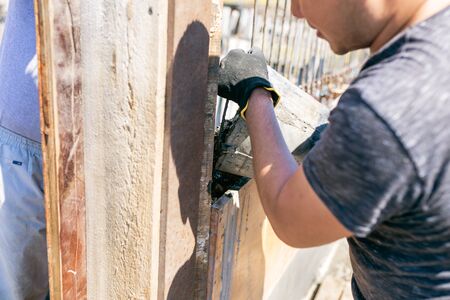 Work with cement mortar, pouring cement mortar wall, foundation and floorの写真素材