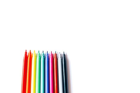 Felt pens of different colors on a white background close-up.の写真素材