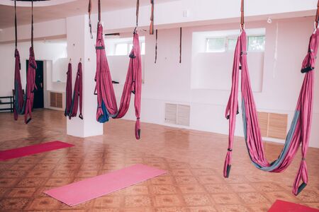 Hammock fixed to the ceiling, fly yoga equipment, yoga gym, health care.の写真素材