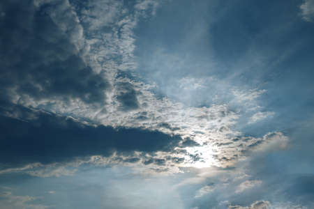 Beautiful cloudy sky, clouds block the sun.の写真素材