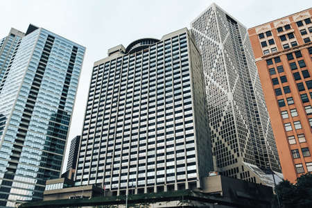 Big buildings in the city on a clear sunny day, career growth.