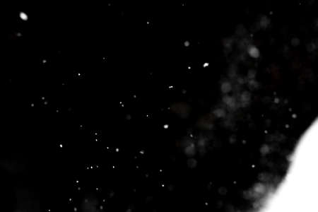 Layer for overlay on black background white snow, white snow on black backgroundの写真素材
