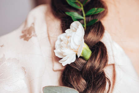 Beautiful nymph woman on a white background, in her hair she has flowers and a wreath of flowers.の写真素材