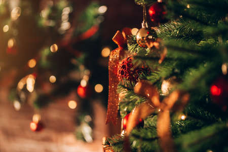 Beautiful and decorated Christmas tree. Christmas mood. Great photo for greeting cards.