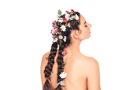 Beautiful nymph woman white background, in her hair she has flowers and a wreath of flowers.の写真素材