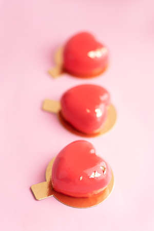 Red heart-shaped cake. Gift for Valentine's Day and Women's Day.