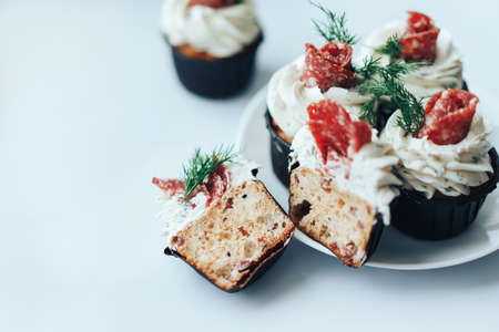 Delicious salty snack made from bread, sausage and cheese on a plate. Snack for alcoholic beverages and for a snack at a party.の写真素材