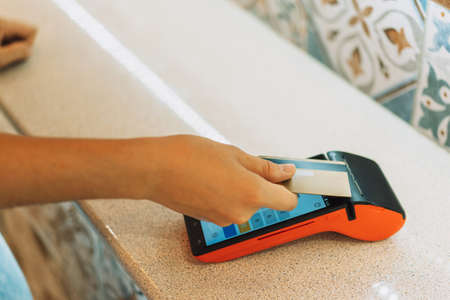 Contactless payment from card via pos terminal.の写真素材