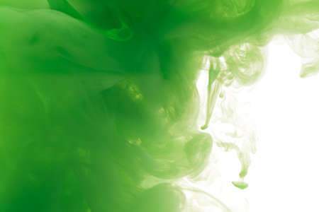 Background from green paint diluted in waterの写真素材