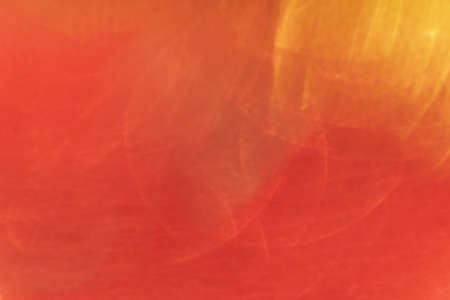 Red yellow blurred background of painted water in redの写真素材