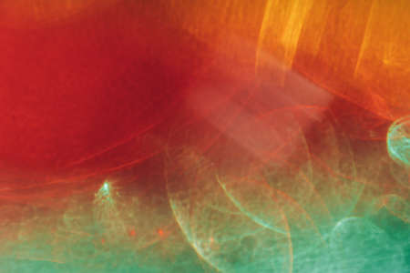 Water background painted red and green, blurred photoの写真素材