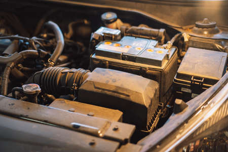Close-up of the air filter and battery tray under the hood