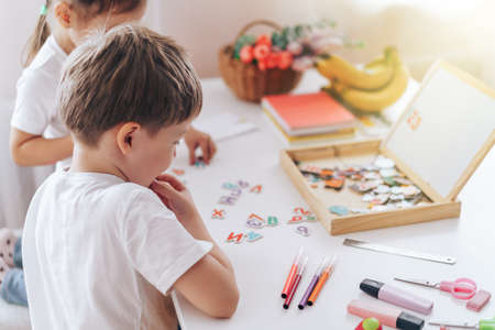 Children play educational games at schoolの写真素材