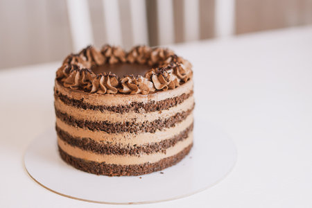 Chocolate puff cake on a round stand