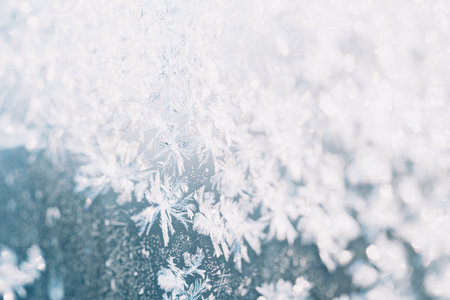 Snowflakes close up on glassの写真素材
