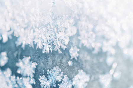 Hoarfrost on glass under sunlight