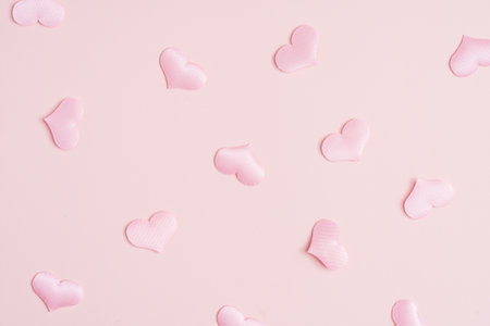 Background pattern pink heart on peach colored paper