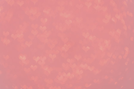 Pink background with heart shaped highlights