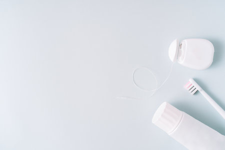 Dental hygiene supplies on a blue backgroundの写真素材