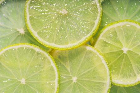 Background of round sliced lime, macro shoot