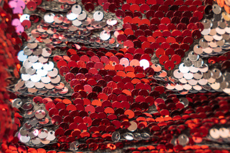 Red shiny sequin background close upの写真素材