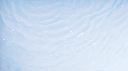 Transparent water surface with reflections and wavesの写真素材