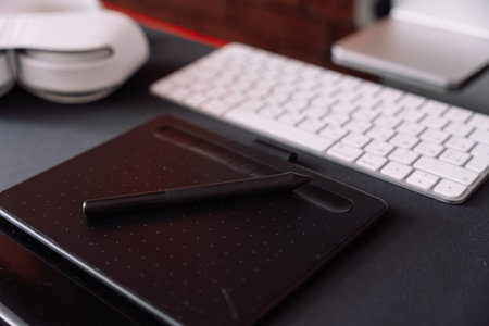 Workplace with computer and wireless peripheral equipmentの写真素材