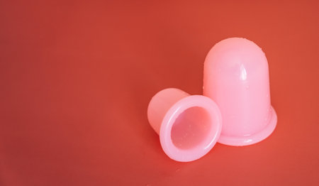 Pink silicone vacuum cups for anti-cellulite massage