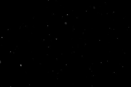 White snowflakes snow on black background overlay layerの写真素材