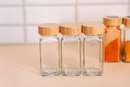 Empty set of glass jars for spices