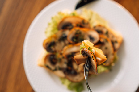 Belgian salty waffles with champignons on white plate.の写真素材