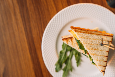 Grilled Ham and Tomato Triangle Sandwiches.
