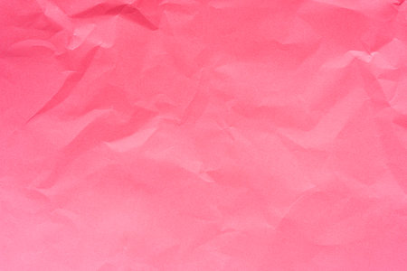 Bright Pink Color Crumpled Paper Backgroundの写真素材
