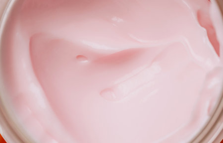 Close up smooth pink cosmetic cream textureの写真素材