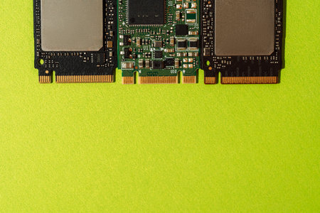 M.2 SSD drives bottom edge aligned on green background with copy space