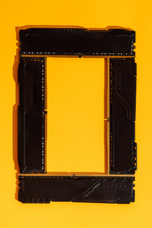 Frame made of RAM modules on bright yellow backgroundの写真素材