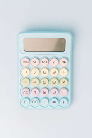 Pastel calculator on light background, minimal finance and accounting concept with copy space.の写真素材