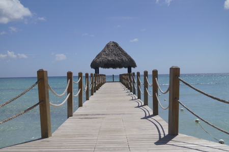 Wooden pier background from a beach at the Dominican Republicの写真素材