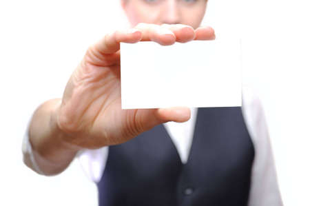 Businesswoman showing a business cardの写真素材