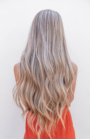Backward of woman with long blonde hairの写真素材
