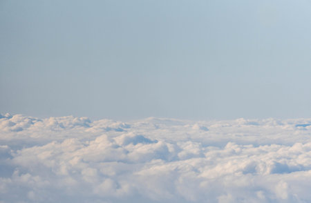 Blue sky and white clouds backgroundの写真素材