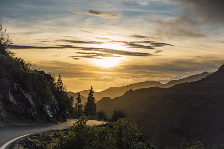 Sunset landscape of mountains full of green color and clear skyの写真素材