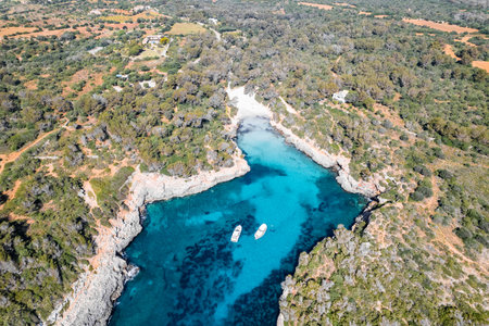 Aerial view of Mediterranean white and turquoise water in Mallorca Cala Mitjanaの写真素材