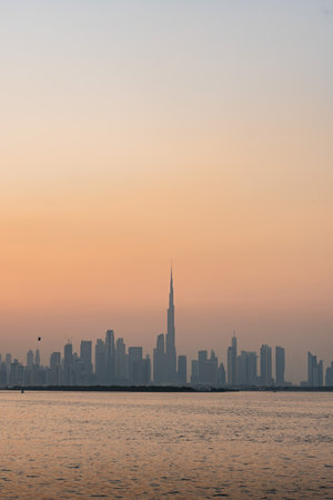Burj khalifa standing tall during golden hour in dubai, united arab emiratesの写真素材