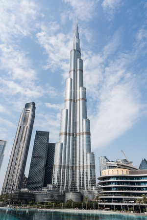 Burj khalifa towering over dubai skyline on sunny dayの写真素材