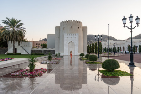 Woman exploring al alam palace area, muscat, omanの写真素材